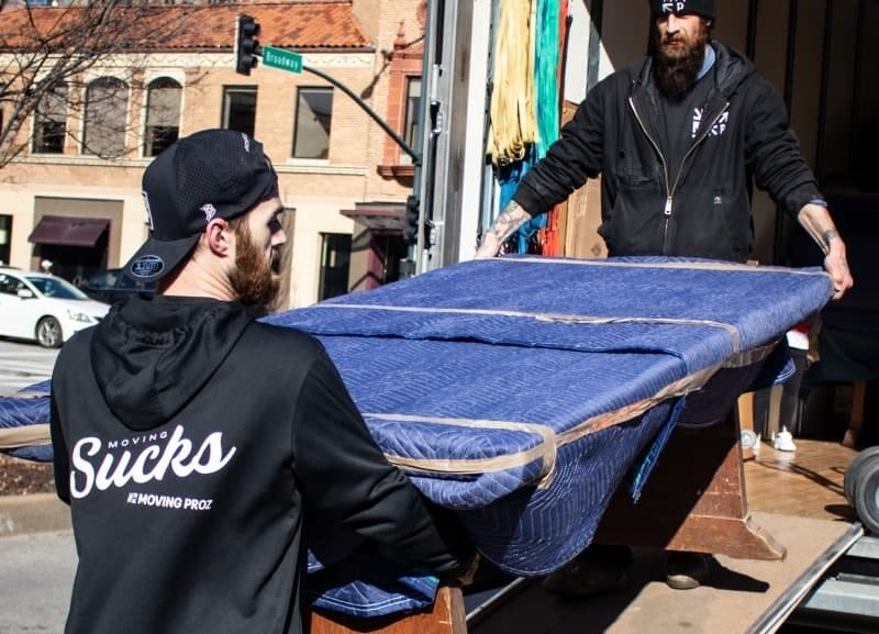 Safely loading belongings in Moving Proz truck